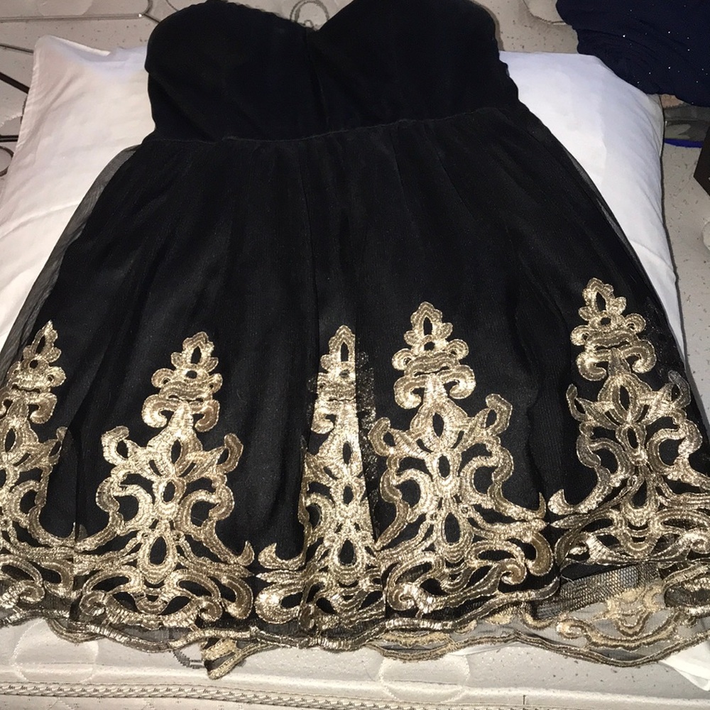 Windsor boaci and gold strapless dress